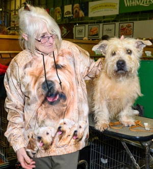 Woman wearing top that matches her dog, at Crufts dog show 2019