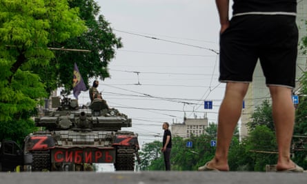 Servicemen from the Wagner group block a street with a tank in Rostov-on-Don on Saturday