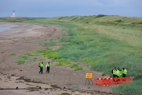 Police officers guarding the Trump Turnberry golf course.