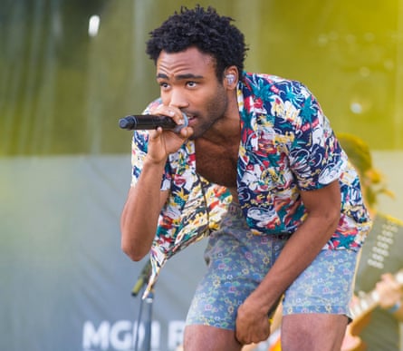 Rapper Childish Gambino performs on stage at the 2014 iHeartRadio Music Festival Village in Las Vegas