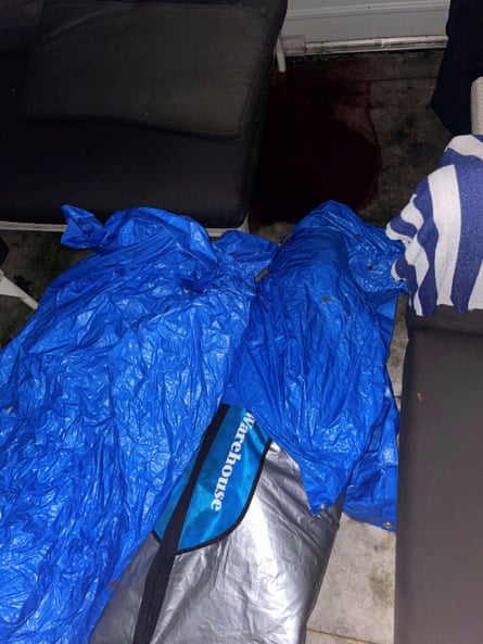 A photo of surfboard bags covered in a tarpaulin in the courtyard of Jesse Baird’s Paddington home, taken by one of his housemates.