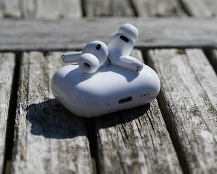 The AirPods Pro 3 sitting on top of their white case