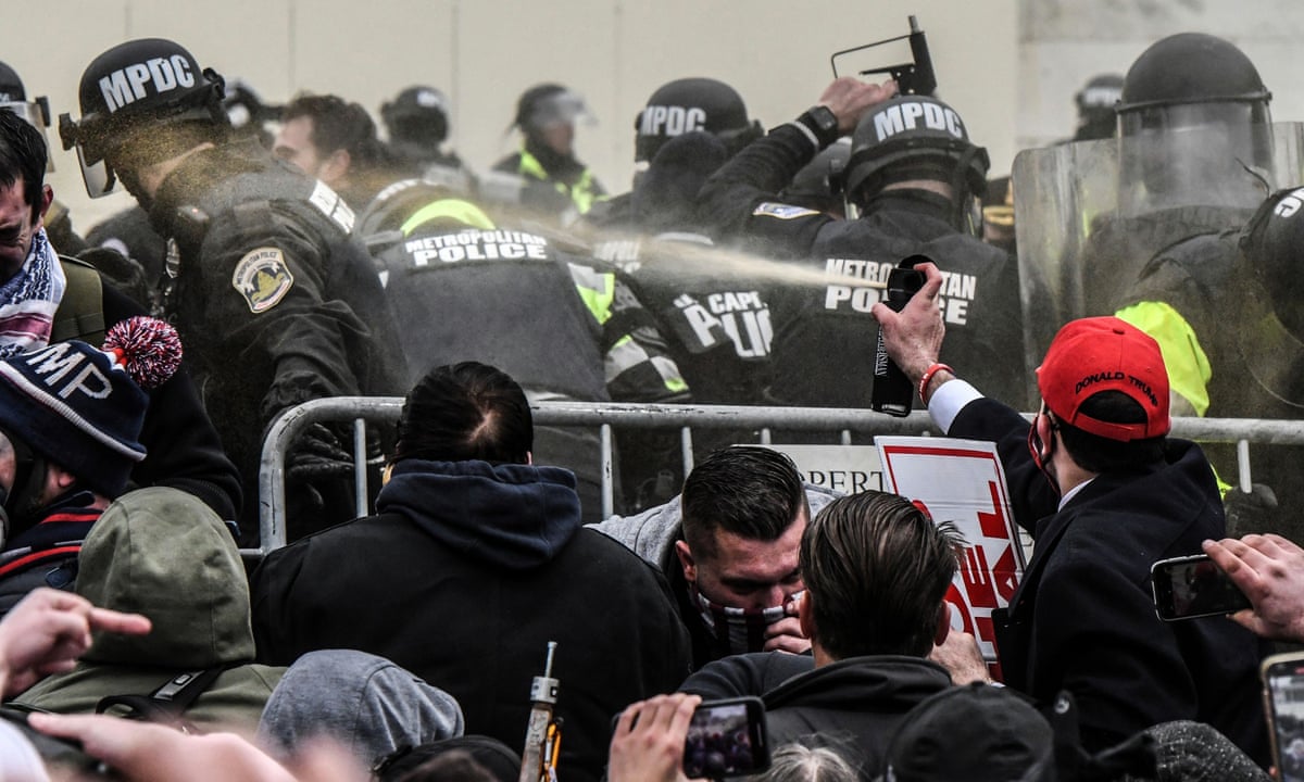 Police officer recalls moment Capitol mob yelled: 'Kill him with his own gun!' | US Capitol attack | The Guardian