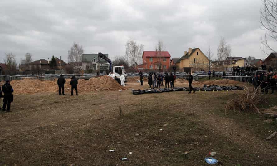 Bodies of people murdered by Russian occupiers are exhumed from a mass grave in Bucha