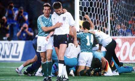 Chris Waddle is consoled by Lothar Matthäus after his miss in the 1990 World Cup semi-final penalty shootout.