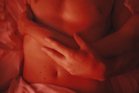 a woman’s arms wrapped around a man