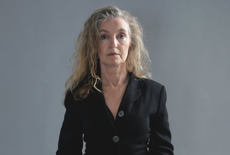 Head shot of writer Rebecca Solnit, against grey background, photographed in 2017