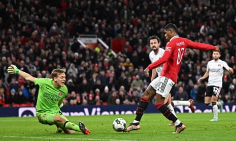 Manchester United's Marcus Rashford scores their second goal past Charlton's keeper Ashley Maynard-Brewer (left) to double the home side’s lead in the closing moments of the game.