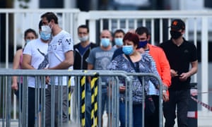 Employees at a meat company that was closed due to coronavirus outbreaks.