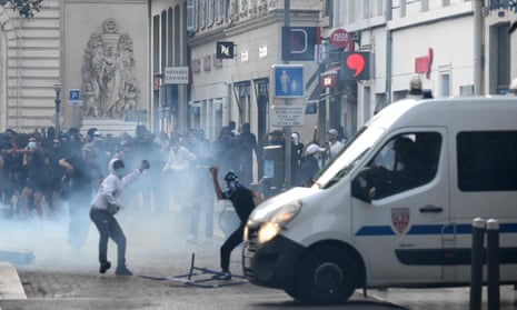 Protesters clash with CRS riot police in Marseille, southern France.