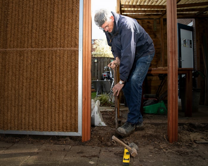 ‘The danger and value of water are in my blood’: how rain fences are making Dutch homes more climate resilient