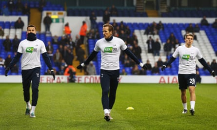 Tom Carroll (right) warms up with Harry Kane and Dele Alli (left) before a Tottenham game against Newcastle in December 2015.