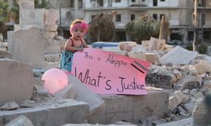 Sama at the end of the documentary holding a sign that formed al-Kateab’s response to US presidential candidate Gary Johnson’s remark, ‘What’s Aleppo?’