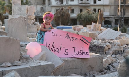 Sama at the end of the documentary holding a sign that formed al-Kateab’s response to US presidential candidate Gary Johnson’s remark, ‘What’s Aleppo?’