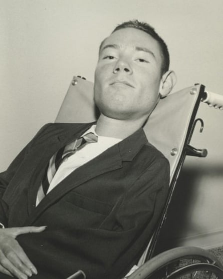 Paul Alexander, who was paralysed by polio in 1952, in a wheelchair while taking a break outside his iron lung, circa 1960s