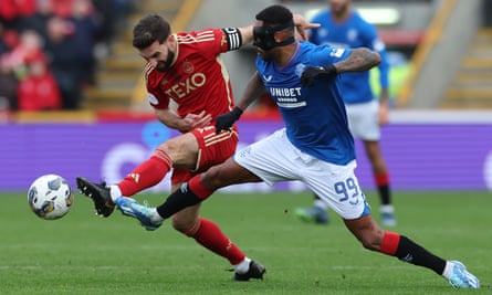 Graeme Shinnie of Aberdeen vies with Danilo of Rangers during the 1-1 draw at Pittodrie in November.