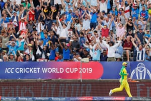 Fans of England celebrate when Roy hits a six to the limit.