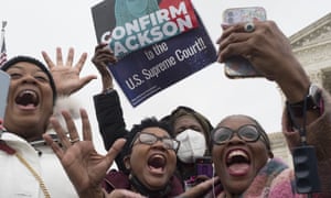 Activists (from left) Nicole Tinson, Teresa Roberts, Sheila Carson and Regina Langley cheer the vote.