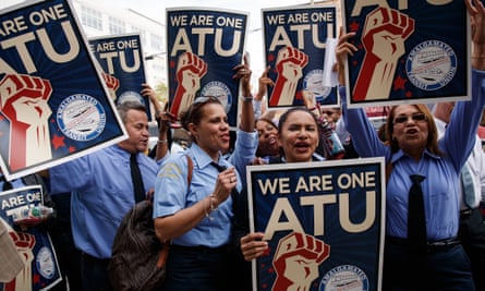 Members of the Amalgamated Transit Union protest in support of Uber and Lyft drivers in New York on 27 September 2016.