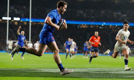 Damian Penaud of France scores his side's sixth try.