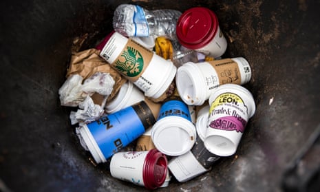 Coffee cups in a bin