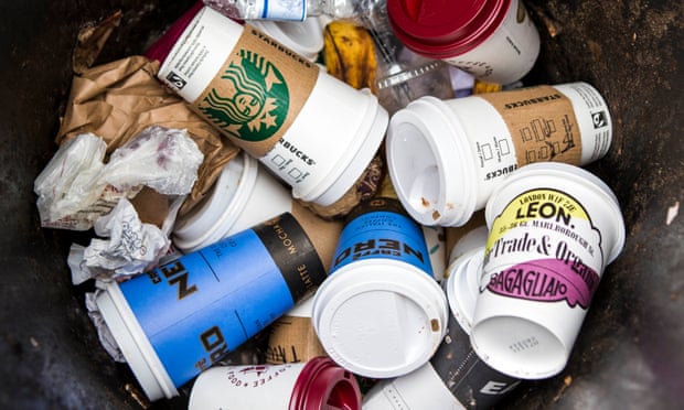 Coffee cups in a street bin