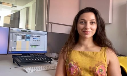 Emma Butt at a desk with computer and audio equipment