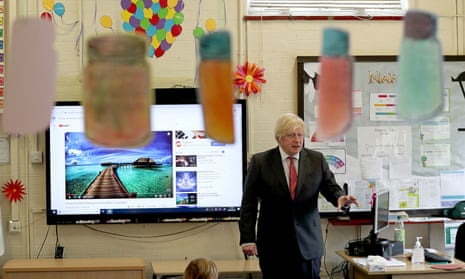 Boris Johnson joins a physically distanced lesson at Bovingdon primary academy in Hertfordshire