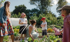 Schoolchildren and teachers at the allotment for the Marlborough School in Cornwall
