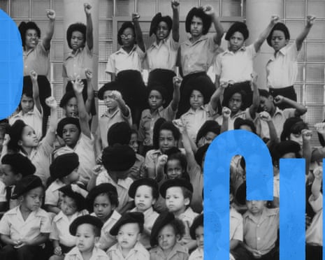 The Black Panther Cubs raise their fists for a school photo