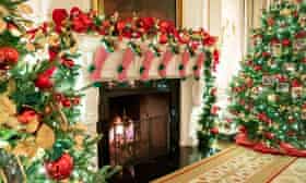 One of the White House fireplaces, with Christmas decorations during a press preview of the White House.
