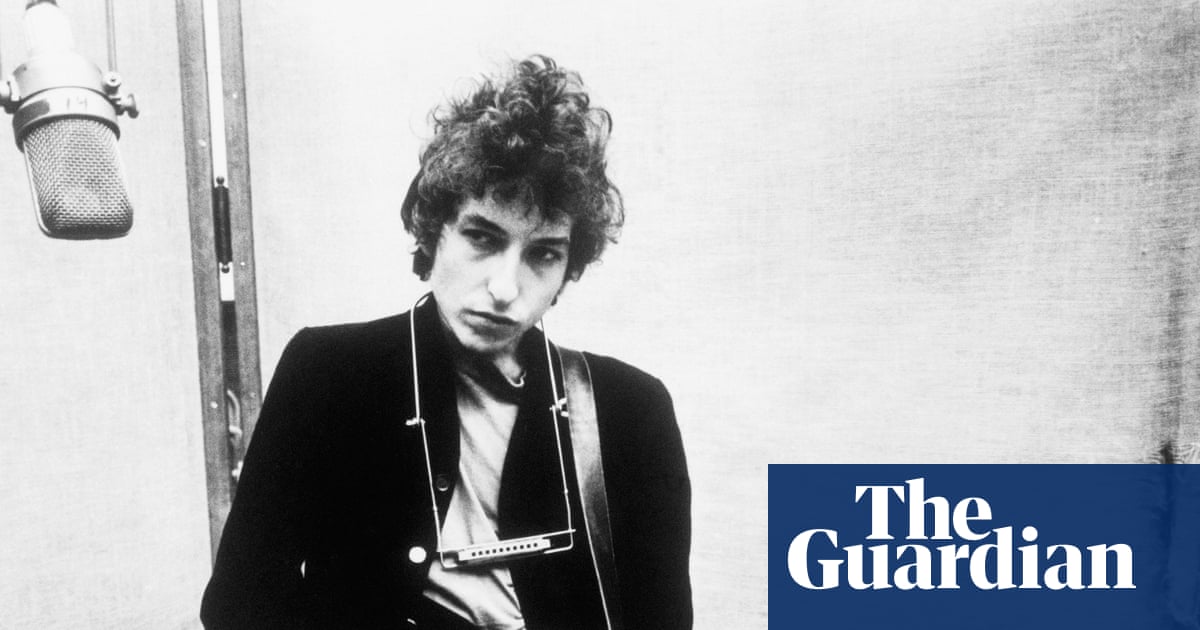 ‘Extremely rare’ Bob Dylan draft lyrics discovered inside Allen Ginsberg book