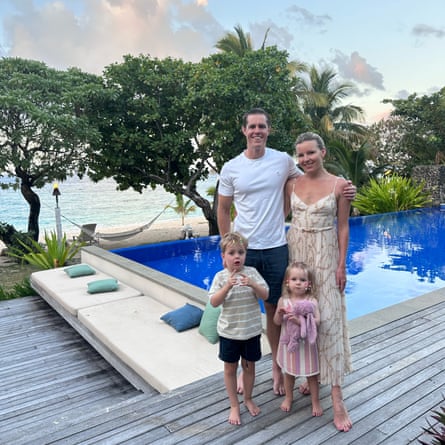 A mum, dad and their two young kids at a Fiji resort