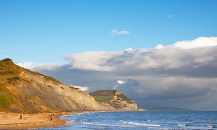 View of the Golden Cap from Charmouth with Burton Bradstock in the distance.