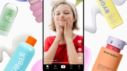 Beauty products and a telephone displaying a video of a kid rubbing a merchandise into their face.