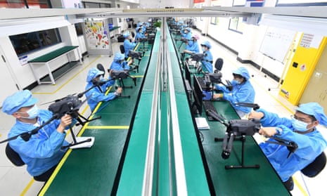 Workers in a factory in Wuhan