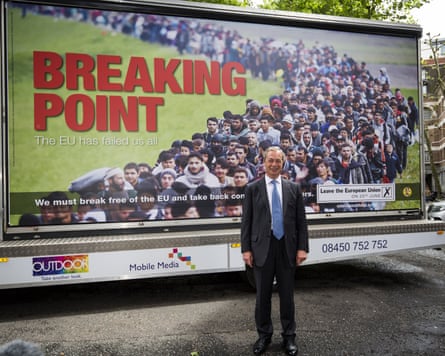 Nigel Farage stands in front of the Breaking Point poster.