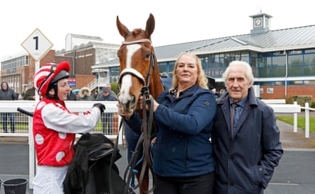 Bill Turner with the jockey Gina Mangan and his daughter Kathy after Umming N’ Ahing won at Nottingham in April 2023