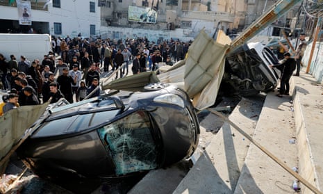 Damaged vehicles after the Israeli raid in Jenin