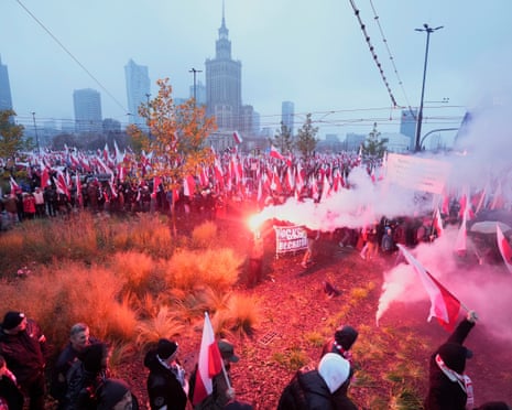 People attend a march to mark the 107th anniversary of Polish independence in Warsaw, Poland.