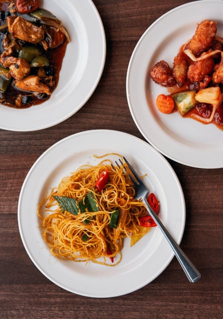 Heat, spice and feisty flavours … clockwise from top left: chicken in black bean sauce, sweet and sour chicken and Singapore noodles.