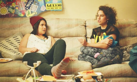 Abbi and Ilana from comedy Broad City, relaxing at home with pizza. Social media gold.