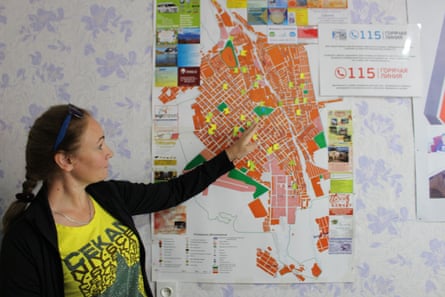 A sex worker rights defender in Karakol, Kyrgyzstan shows Front Line Defenders a map of brothels in the city where activists conduct outreach to at-risk sex workers