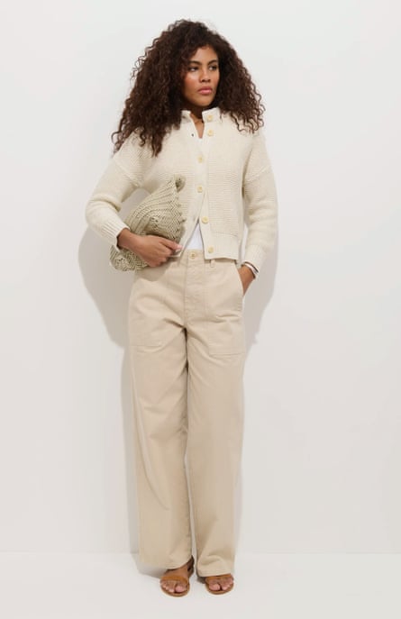 woman wearing cream cardigan and beige pants