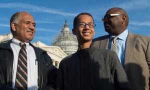 Ahmed Mohamed, centre, is flanked by his father, Mohamed Elhassan Mohamed, left, and spokesperson Ron Price, right, at an event in Washington on Tuesday.