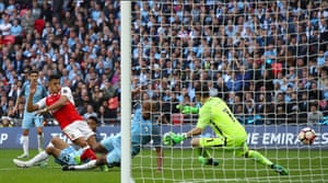 Alexis Sanchez scores the winner, defeating City 2-1 and sealing a place in the final against Chelsea.