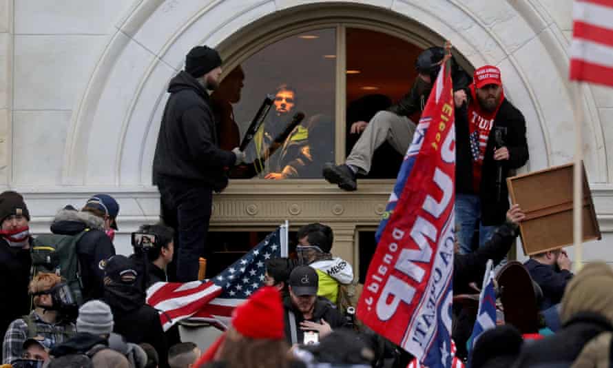 The US Capitol building is stormed by a pro-Trump mob on 6 January 2021