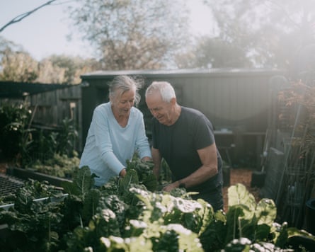 man and woman gardening