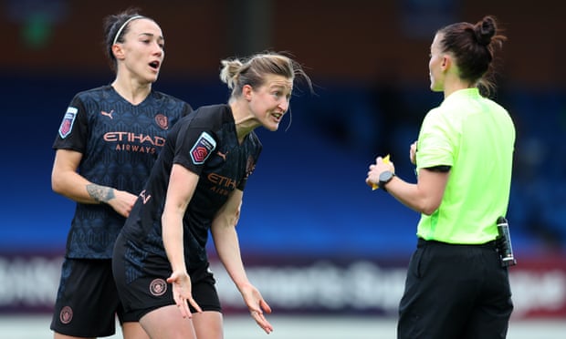Ellen White and Lucy Bronze make their case to the referee, Rebecca Welch, after she gave a controversial penalty against Manchester City in their WSL defeat to Chelsea. 