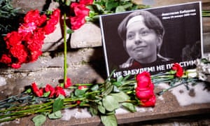 Flowers laid in Moscow last week in memory of lawyer Stanislav Markelov and journalist Anastasia Baburova at the site of their murder in 2009. 